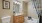 a bathroom with a tub sink and toilet