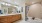 a bathroom with a tub sink and a mirror